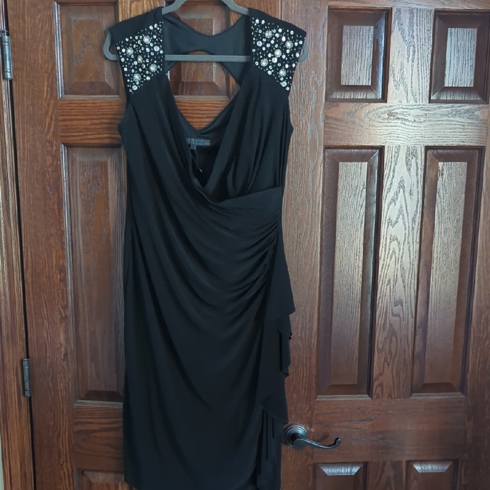 Elegant Black Sleeveless Dress with Embellished Shoulders